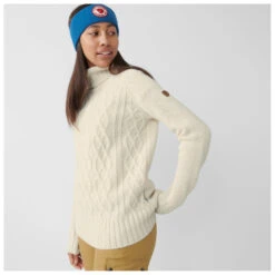 FJÄLLRÄVEN Women's Övik Cable Knit Roller Neck - Wool Jumper 6 FJÄLLRÄVEN Women's Övik Cable Knit Roller Neck - Wool Jumper -Outdoor Wear Store fjaellraeven womens oevik cable knit roller neck wool jumper detail 3